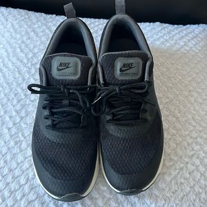 Nike running shoes. Worn only a few times and in excellent shape.